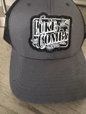 The Classic Black Mesh Trucker Hat with Gold Logo